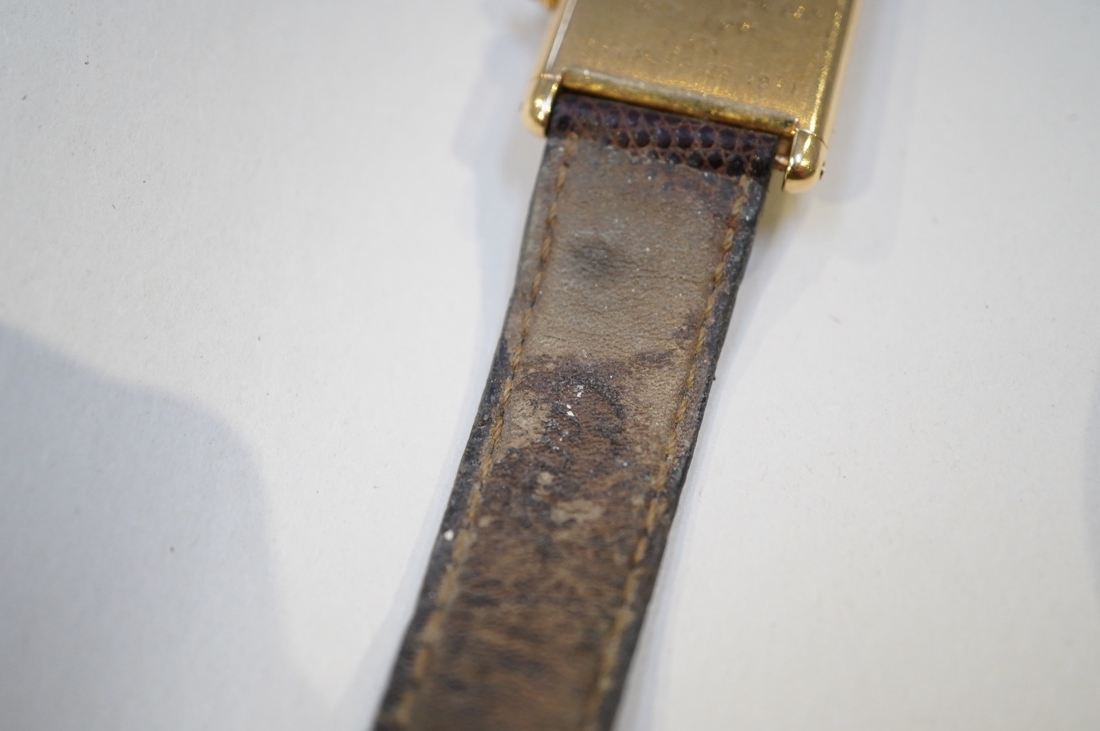 Richard Avedon (American, 1923-2004), a Cartier 18ct. gold tank manual wind wrist watch